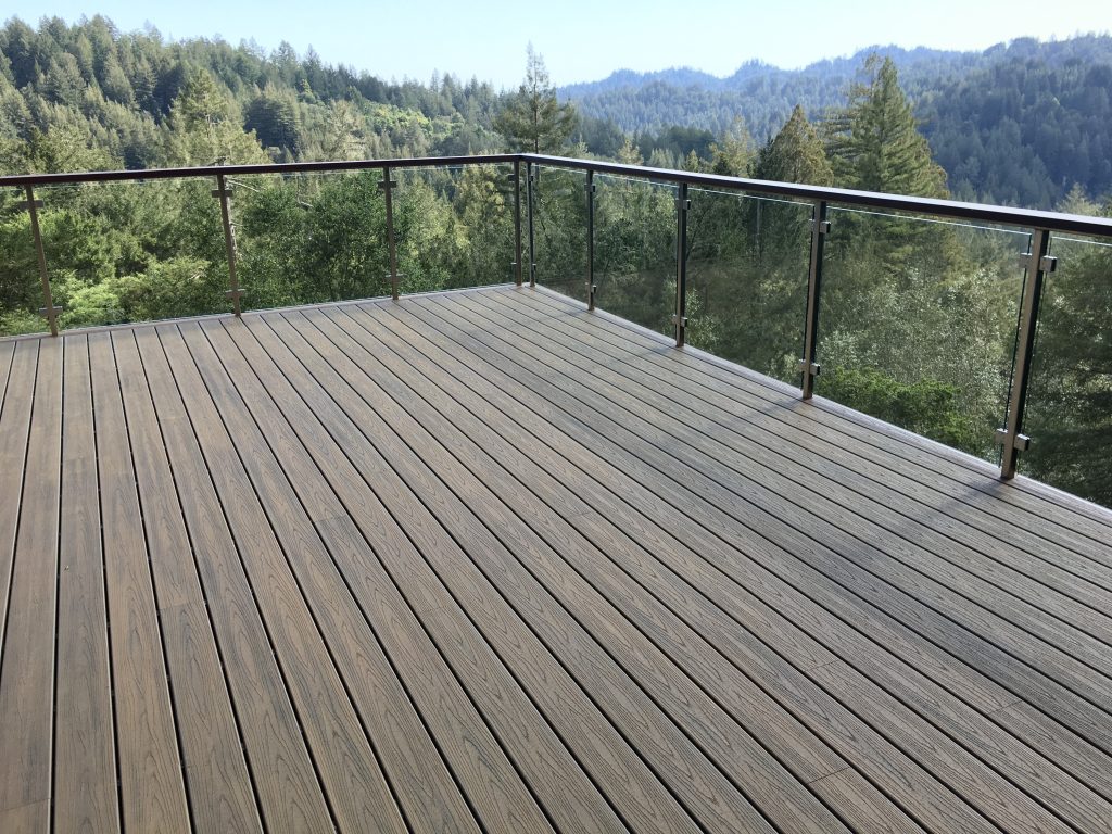 Deck with railing installed by Decks by DeCamp