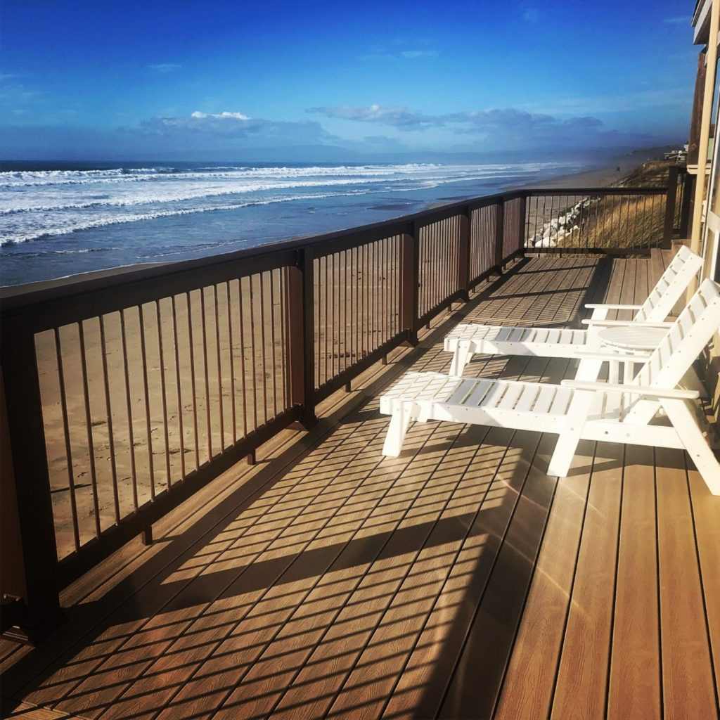 Deck with railing installed by Decks by DeCamp