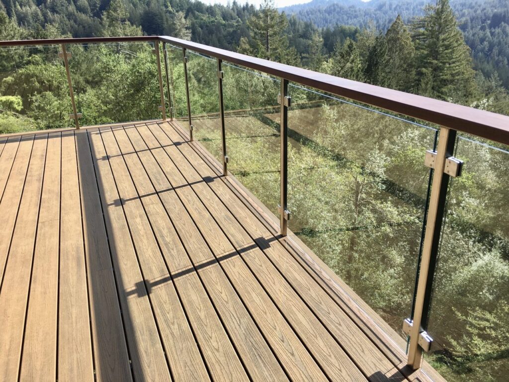 Deck with railing installed by Decks by DeCamp